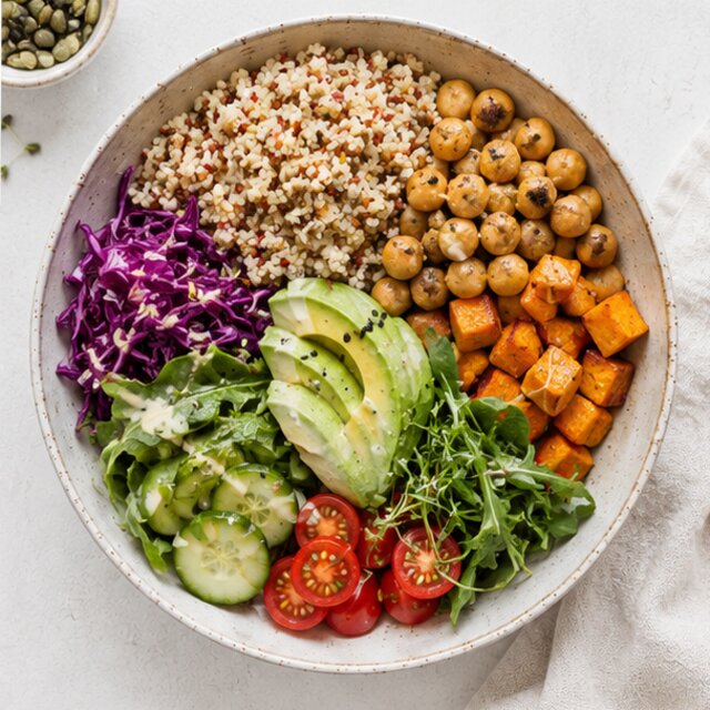 Chickpea, brown rice, spinach and tomato bowl